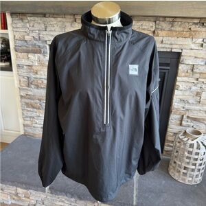The North Face Black Windbreaker with Collar and Half-Zip